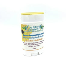 Charger l'image dans la galerie, Baume corporel hydratant dans un tube blanc. Le bouchon est ouvert en l'on peut voir la belle texture dorée du baume.